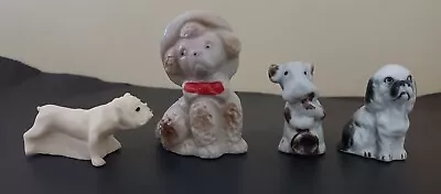 Lot Of 4 Miniature Dog Figurines • $5