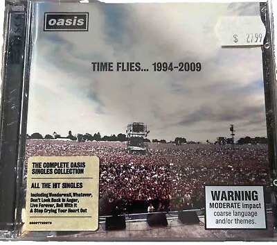 Time Flies... 1994-2009 By Oasis (CD 2010) The Complete Oasis Single Collection • £9.45