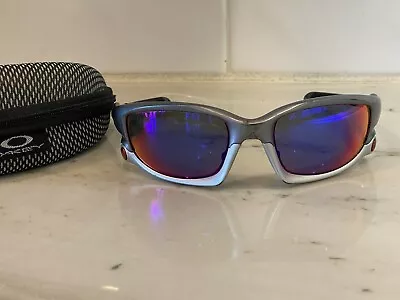 Oakley Split Jacket Dark Grey W/ Positive Red Iridium Polarized SKU# 9099-06 • $189