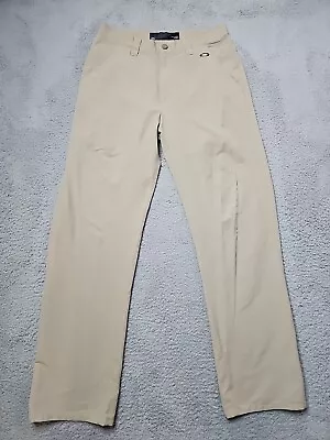 Oakley Pants Mens 32 Beige Golf Chino Flat Front 32  Inseam Nylon Spandex • $23.49