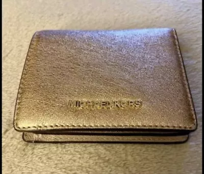 Woman’s Michael Kors Metallic Rose Gold Jet Set Wallet • $75