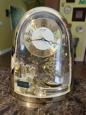 Vintage RHYTHM Gold Mantel Quartz Clock Works Spinning Pendulum Shooting Stars • $12