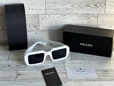 Prada Sunglasses • $99