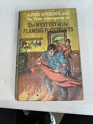 The 3 Investigators -The Mystery Of The Flaming Footprints -Collins Short Ed. HB • £25.85