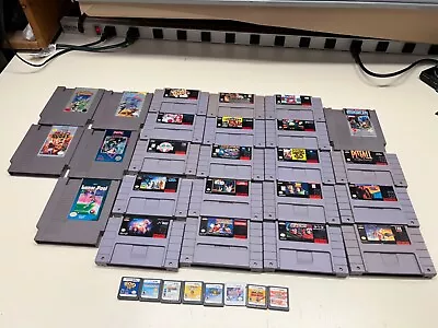 (32) Video Game Lot For Nintendo Snes Nes Ds Megaman Ds Bad Dudes Contra Mario • $102.50