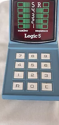 Vintage Milton Bradley Logic 5 Handheld Memory Sequence Computer Game. Working. • £10