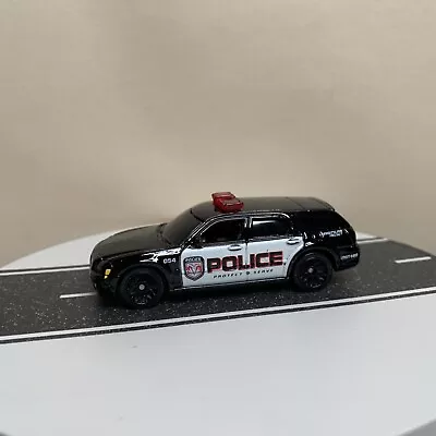 2006 Matchbox MBX Metal #38 Dodge Magnum Police Car Wagon Black/White 1:64 NRMT  • $10.95