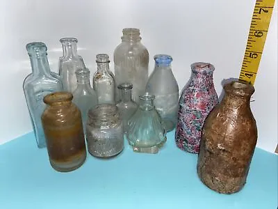 Lot Of 11 Antique Aqua & Clear Embossed USA Medicine Bottles Original Vintage • $20