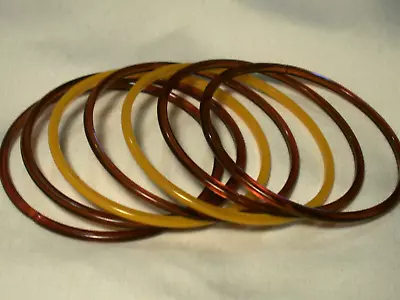 ...Seven(7) Vintage/Antique Brown/Amber Colors Glass Bangle Bracelets... • $18.97