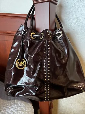 Michael Kors Women’s Satchel Patent Bordeaux/Gold Studded  • $185