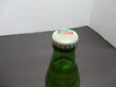 Mountain Dew Ndnr Glass Soda Bottle Paper Label 10  Oz Green Glass • $18.99