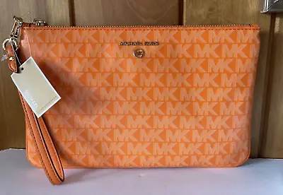 New Michael Kors Jet Set Charm Large Top Zip Wristlet Apricot Orange • $55