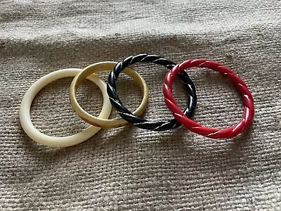 Set Of 4 Vintage Plastic Bangles  • $10.35