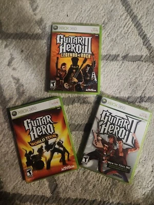 $30 • Buy XBOX 360 Games Guitar Hero Bundle (3 Games)