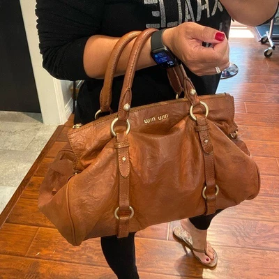 $695 • Buy MiuMiu Vitello Lux LargeBow Satchel In Palissandro