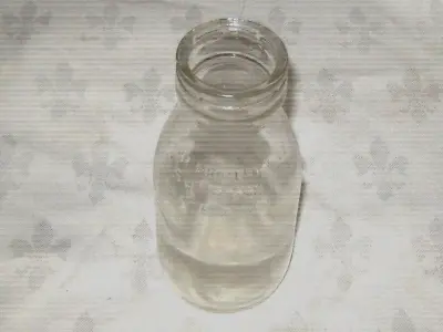 A Vintage N.S.W. Fresh Food & Ice P/L Embossed 1/2  Imp. Pint School Milk Bottle • $9.60