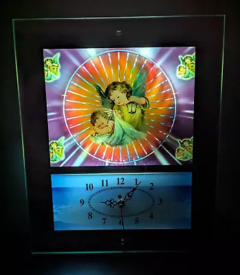 Vintage Spinning Psychedelic Motion Light Angel Mirrored Wall Clock • $41