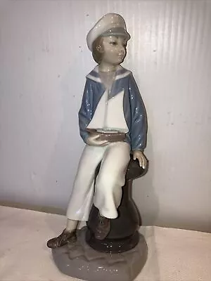 Retired Lladro Porcelain #4810 Sailor Boy With Yacht Sailboat Figurine 9  • $55