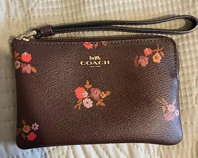 Coach Purse - Chocolate Brown With Floral Detail And Wrist Strap. • £23