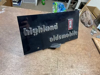 Dealership License Plate Vintage Highland Oldsmobile Plastic Rustic • $19.25