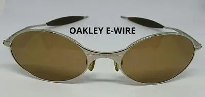 OAKLEY E-wire [‘90s] Color: Gold (frame) X Brown (lens) Accessories Eyewear • $379.99