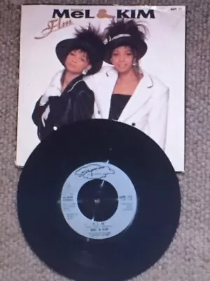 Mel And Kim. FLM. 7  Record **NEAR AS NEW** • £4.99