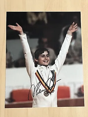 NADIA COMANECI HAND SIGNED 8x10 PHOTO OLYMPICS GYMNAST AUTOGRAPHED GOLD RARE COA • $49.99