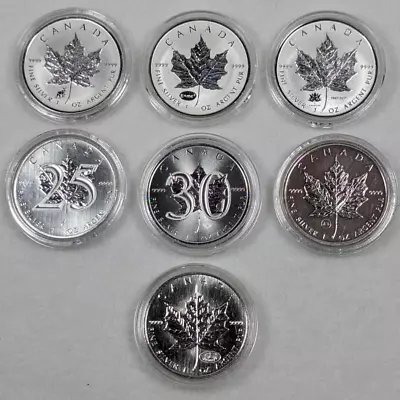 Collection Of 7  Interesting  9999 Silver Canadian Maple Leaf 1oz Coins • £275