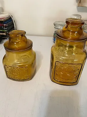 A Pair Of Vintage Wheaton  NJ  Honey Amber Glass Jar With Lid Fish And Heart • $19.99