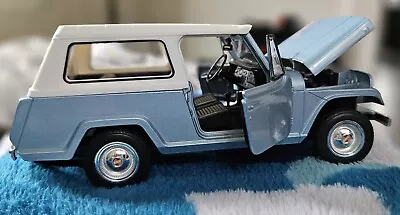 Welly Jeep Jeepster Commando Station Wagon NEW 1:24 Scale Car 24117 Blue • $20.71