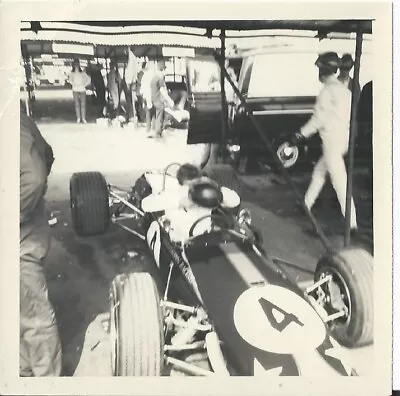 JIM CLARK PREPARES TO GO OUT IN LOTUS 1960s B/W PHOTOGRAPH • £8.99