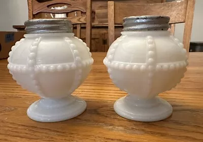 Vintage Milk Glass Labeled Salt And Pepper Shakers With Medal Lids • $14