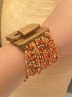 MONIES GERDA LYNGGAARD Wood Buckle Multi Glass Beaded STATEMENT BRACELET Orange • $27