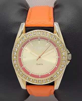 Ladies Manhattan By Croton Gold Tone Paved Orange Faux Leather Band Watch I5 • $8.99