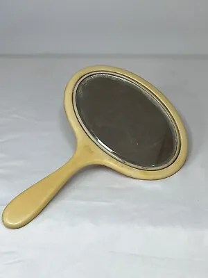 Antique Vanity Hand Mirror Celluloid Beveled Glass Pale Yellow Bakelite • $15.99