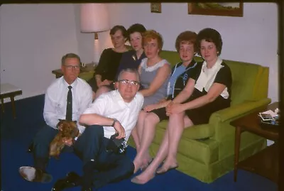 Vtg 35mm Slide Group Women Legs Men Man Holds Box Camera Dog Green Couch 1969 • $10.28