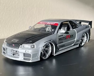 Jada Toys 1/24 Import Racer Motorex Nissan Skyline GTR R34 HOOD & SPOILER REMOVE • $39.99