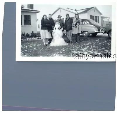 Found B&w Photo G_1751 Men And Woman A Dog And Snowman • $6.98