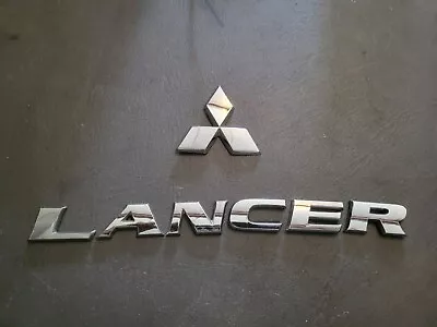 2002-2003 Mitsubishi Lancer Rear Trunk Lid  Emblem Badge Nameplate OEM • $26