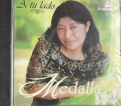 Medalla A Tu Lado Vol 14 • $10.99