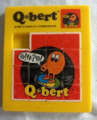 1983 Qbert Sliding Square Puzzle Handheld Plastic American Publishing Vintage • $24.99