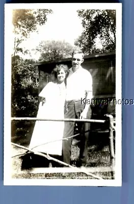 Found B&w Photo D_1287 Man Posed With Pretty Woman By Fence • $6.98