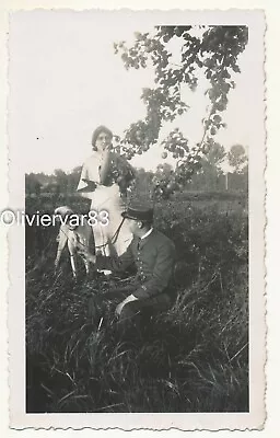 Vintage Photo - Woman Eating Fruit Dog And Man In Uniform • $4.90