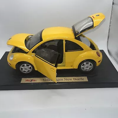 MAISTO YELLOW VW NEW BEETLE SPECIAL EDITION DIE CAST 1:18 - 9  See Description • $24