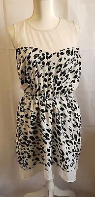 W118 Walter Baker Cheetah Print Dress Size Medium Sheer Portions Skirt Lined  • $21.99