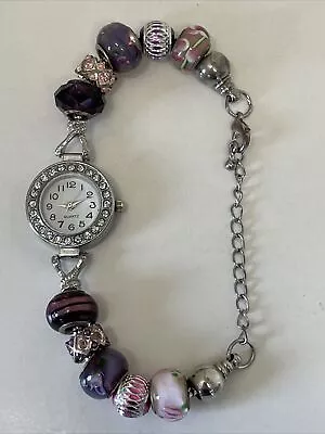 Ladies Festival/charm Bracelet Watch - Purple/pink • £12