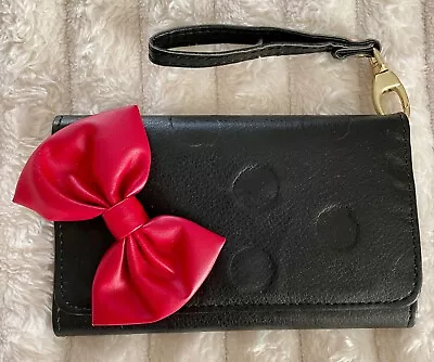 Disney Store IPhone 6 Minnie Mouse Signature Leather Bow Wristlet Case. • $17