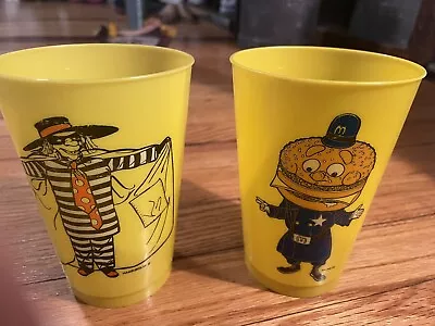 Vintage Set Of 2 Mcdonalds Yellow Plastic Cup Humburglar And Big Mac  • $8