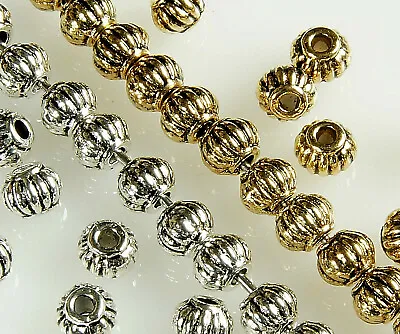 100 METAL SPACER BEADS FOW JEWELLERY MAKING BICONE MELON MULTICOLOUR5 X 4MM • £1.79