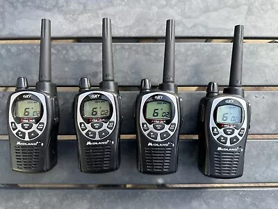 MIDLAND GXT1000G 2-Way Radios ( 4 Radios Batteries Chargers 2 Cases) • $150